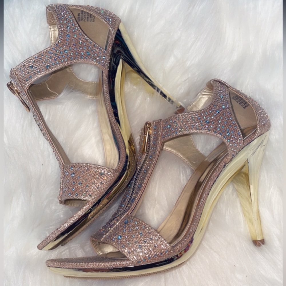 Ladies size 8 gold with rhinestone heels.